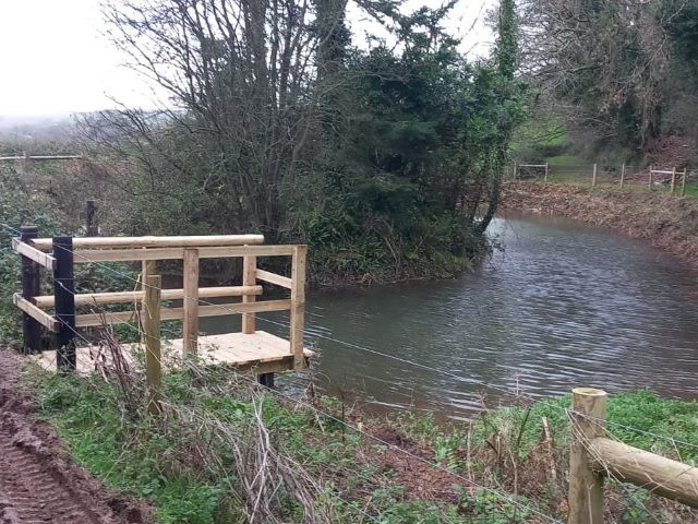 Wooden jetty over a river