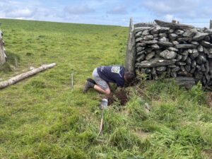 an image of a person fixing a wall